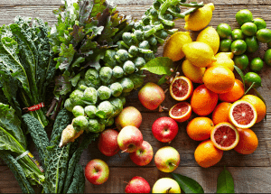 a group of fruits and vegetables on a wood surface Healthy Weight Loss Diets Bishopbriggs